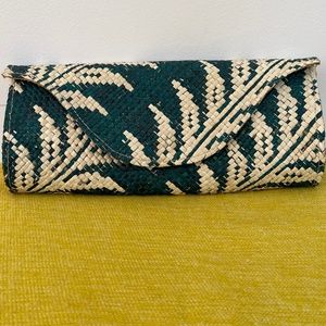 Banago woven palm clutch